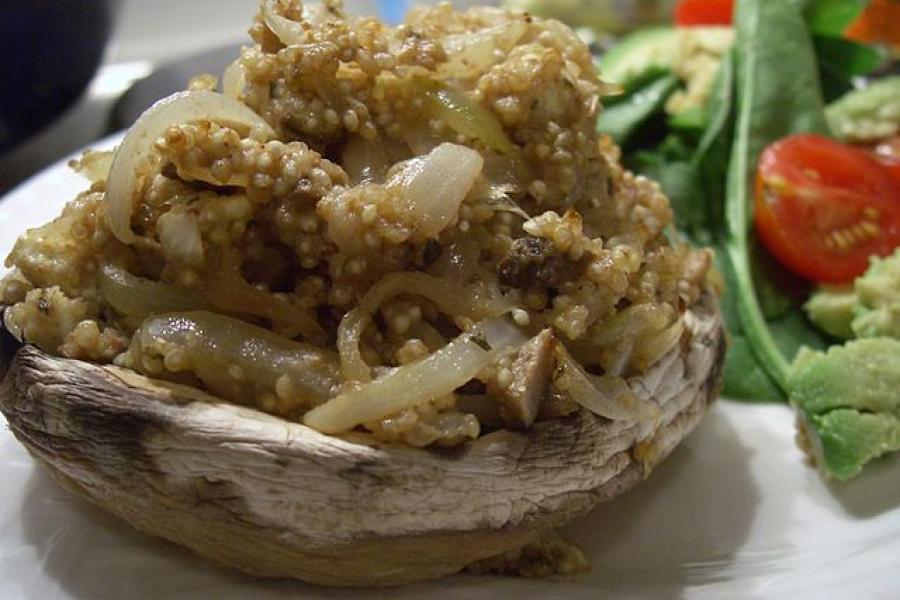 Mushroom stuffed with spicy quinoa.