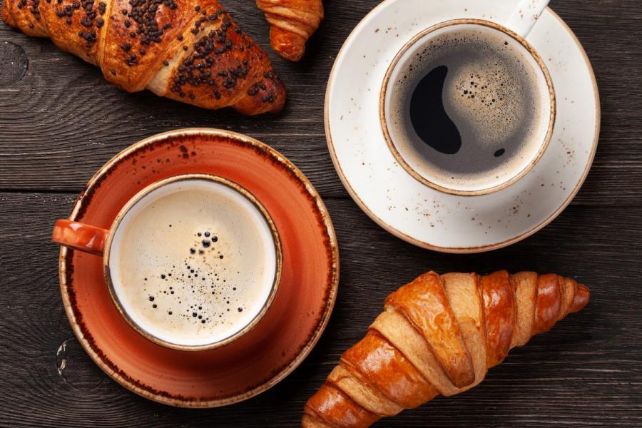 Coffee and croissants for an Italian breakfast.